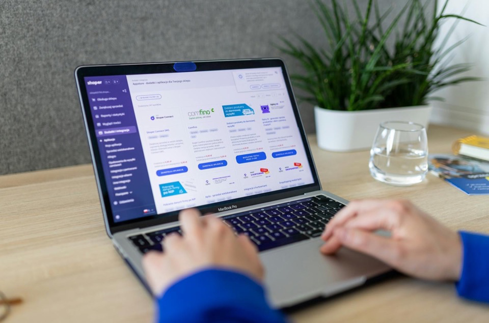 Ecommerce operator reviewing business decisions at a laptop